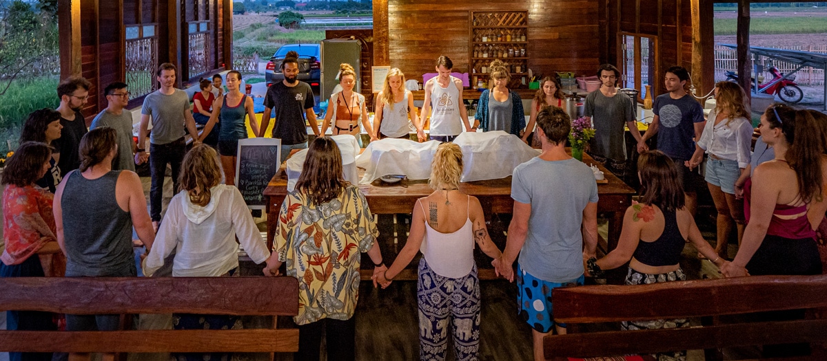 Chiang Mai Yoga Retreat Community Holding Hands